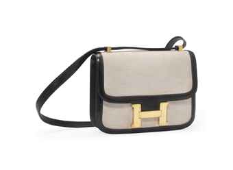 A BROWN LEATHER AND TOILE 'CONSTANCE' BAG  
