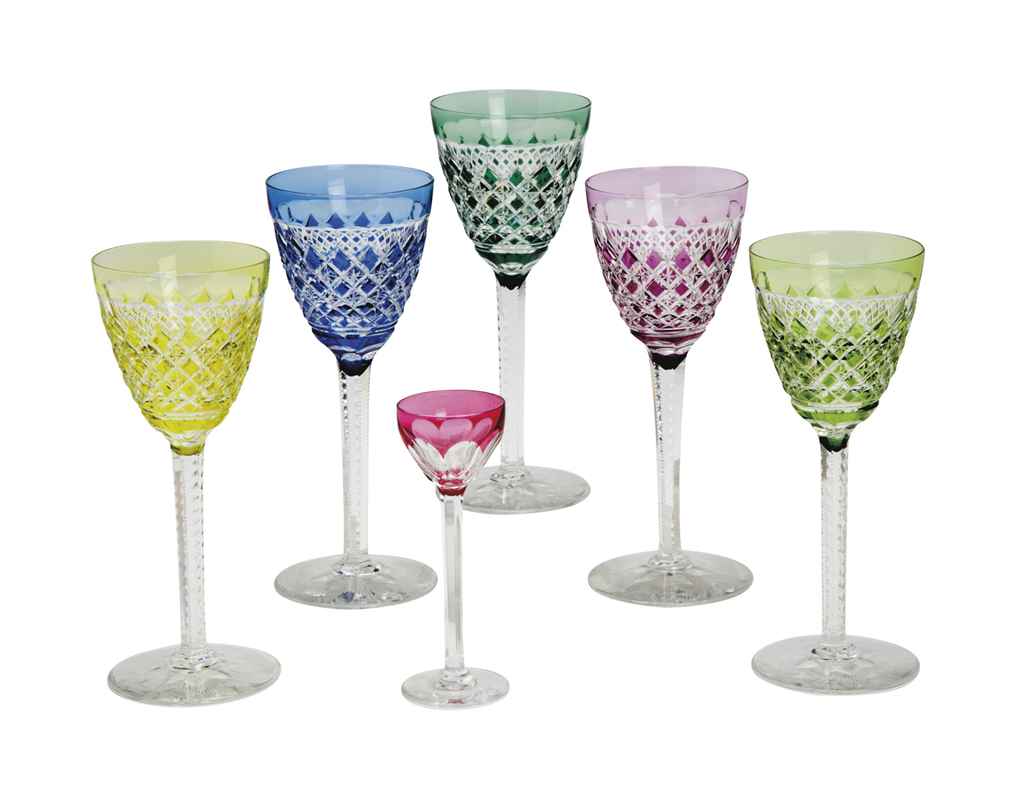 A SET OF NINE COLORED CUT GLASS WINE GLASSES, AND THREE CORDIALS, , 20TH CENTURY Christie's
