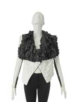 A BLACK AND WHITE CROPPED JACKET  