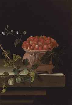 A bowl of strawberries with gooseberries on a stone ledge  