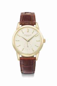 Patek Philippe. A fine and rare 18K gold wristwatch with enamel dial  