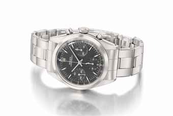 Rolex. A fine and rare stainless steel chronograph wristwatch with black dial and bracelet 