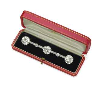 A DIAMOND BAR BROOCH, BY CARTIER  