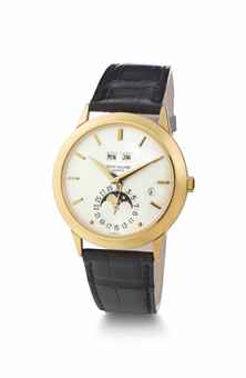 Patek Philippe. A Very Fine and Rare 18k Gold Automatic Perpetual Calendar Wristwatch with Moon Phases and Roman Leap Year Indicator 