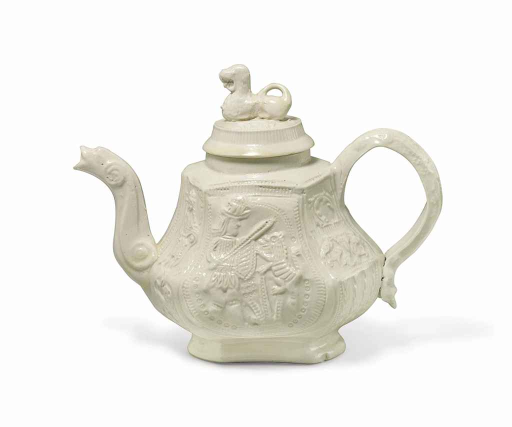 A STAFFORDSHIRE SALTGLAZED STONEWARE 'JACOBITE' TEAPOT AND C...