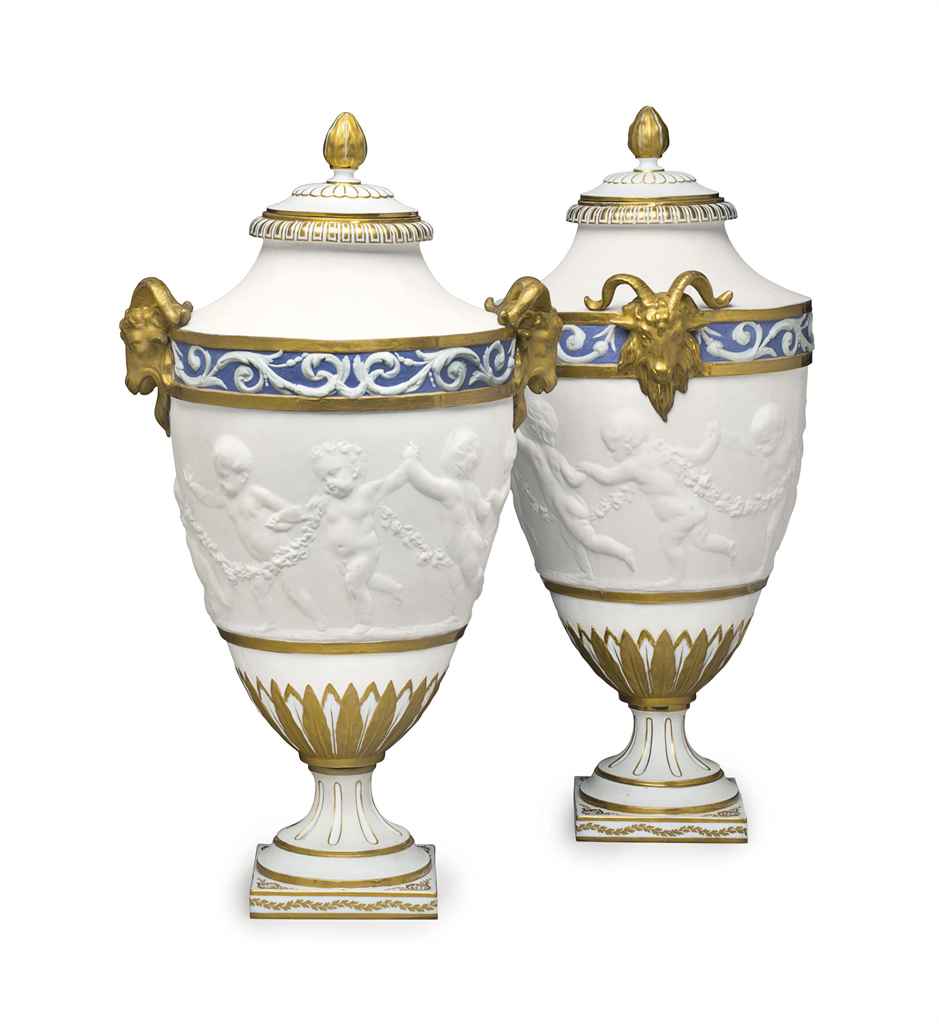 A PAIR OF SEVRES STYLE BISCUIT PORCELAIN VASES AND COVERS , LATE 19TH