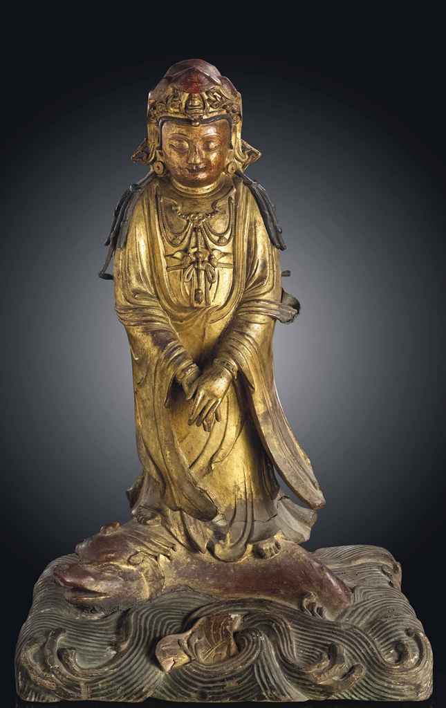 A LARGE GILT-LACQUERED BRONZE FIGURE OF GUANYIN