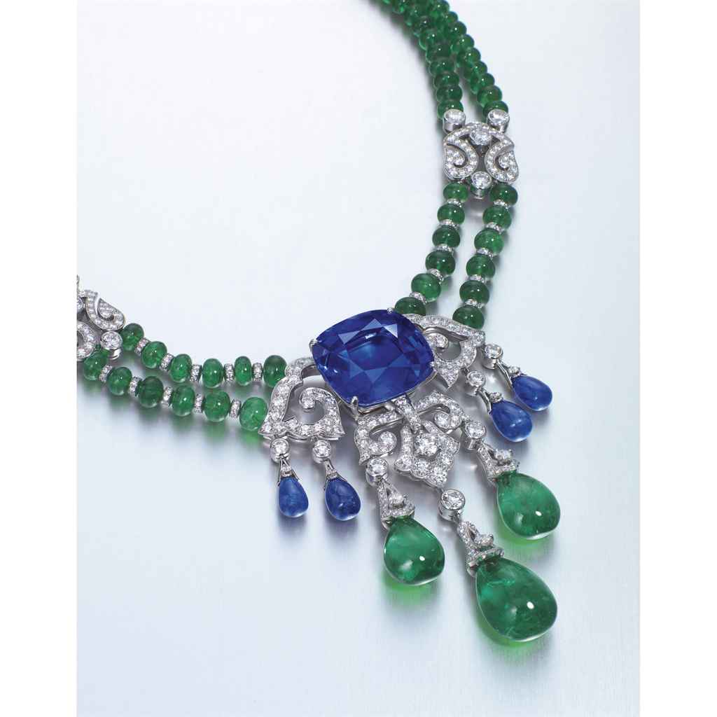 A SAPPHIRE, EMERALD AND DIAMOND PENDENT NECKLACE/BROOCH, BY CARTIER Christie