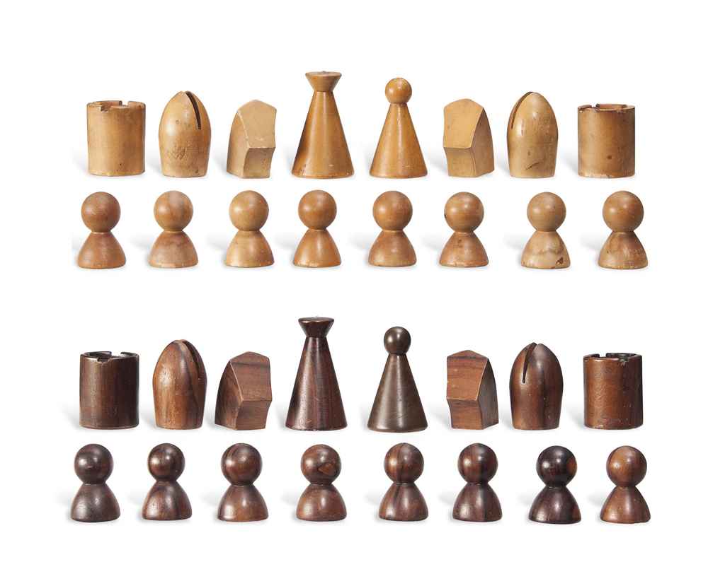 A Walnut And Beech Chess Set By Man Ray () - A Walnut And Beech Chess Set a walnut and beech chess set by man ray () - a walnut and beech chess set