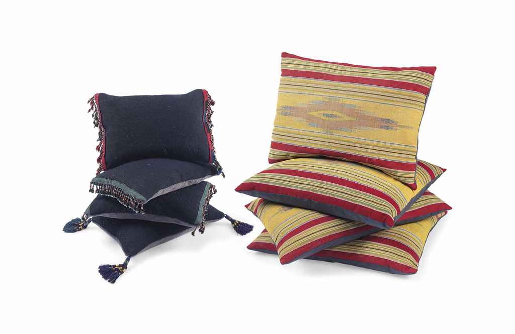 A SET OF FOUR ANATOLIAN WOOL CUSHIONS AND A SET OF FOUR ALEP...