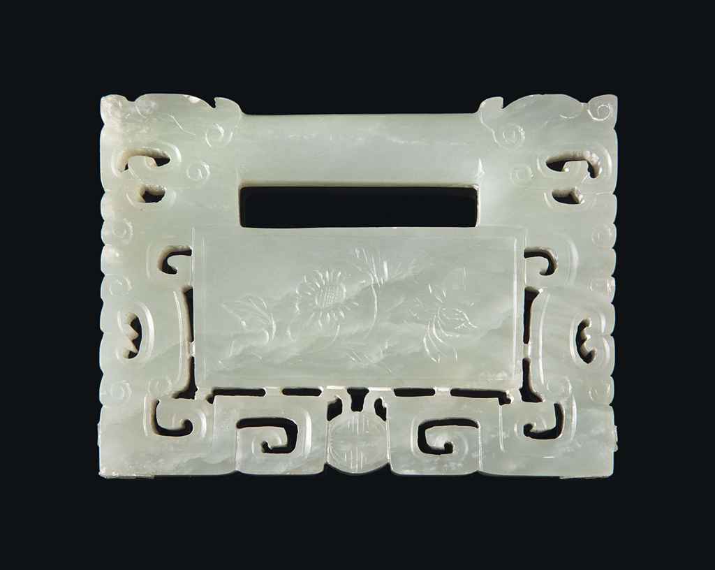 A CHINESE PALE CELADON JADE RECTANGULAR LOCK-FORM PLAQUE