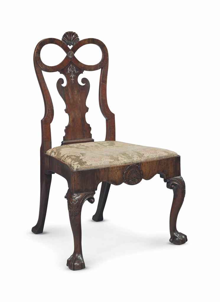 A GEORGE I WALNUT SIDE CHAIR