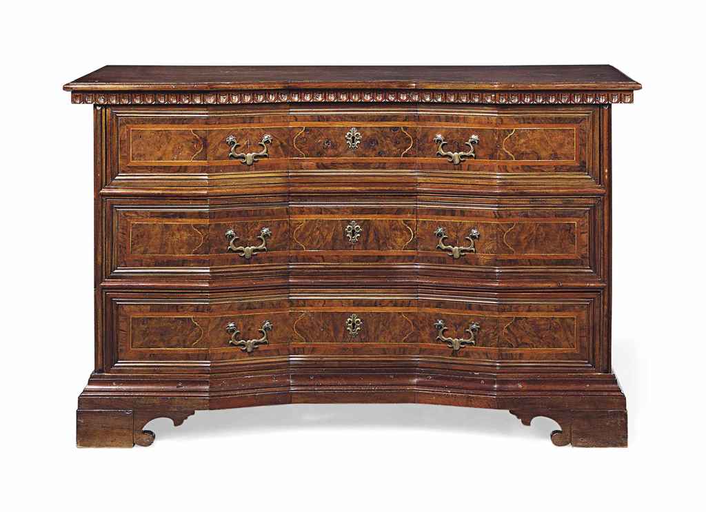 A NORTH ITALIAN WALNUT AND FIGURED WALNUT COMMODE