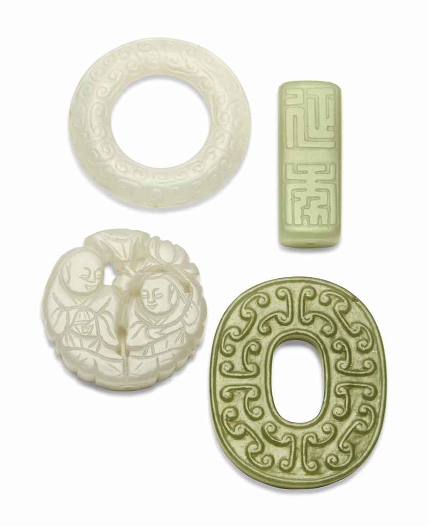 A GROUP OF FOUR JADE CARVINGS