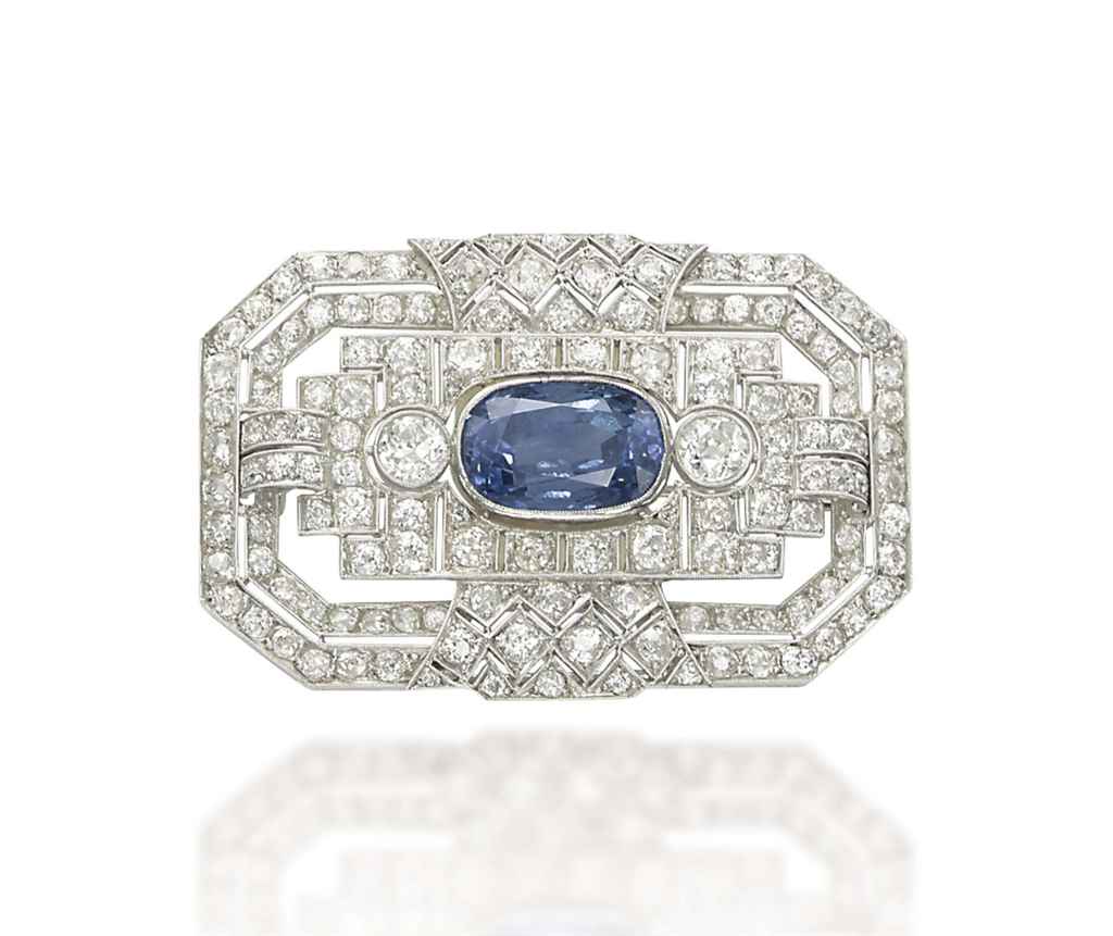 AN ART DECO SAPPHIRE AND DIAMOND BROOCH