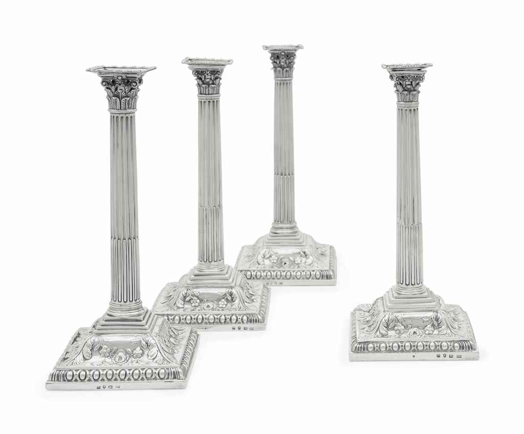 TWO PAIRS OF GEORGE III SILVER CANDLESTICKS