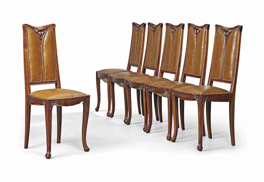 A SET OF LOUIS MAJORELLE (1859-1926) ART NOUVEAU CARVED WALN...