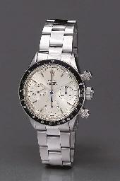 Rolex. A fine and rare stainless steel water-resistant chronograph wristwatch with exotic monochromatic silvered dial 