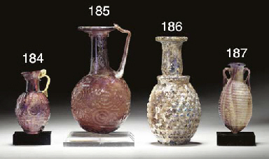 A ROMAN GLASS GRAPE FLASK  