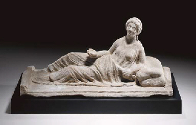 AN ETRUSCAN TERRACOTTA CINERARY URN LID  