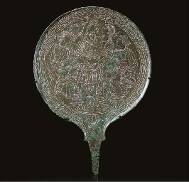 AN ETRUSCAN BRONZE MIRROR  