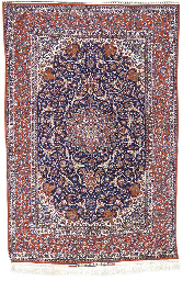 AN ISFAHAN SEIRAFIAN RUG