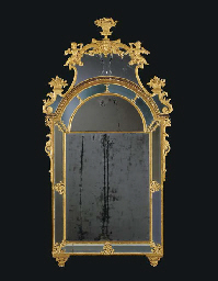 A SWEDISH GILTWOOD AND GILT-LEAD MIRROR  