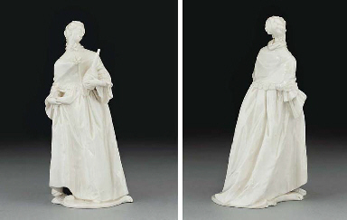 A NYMPHENBURG WHITE FIGURE OF DONNA MARTINA FROM THE COMMEDIA DELL'ARTE SERIES