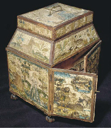 An embroidered casket, worked in couched silks with the sacrifice of Isaac embroidered to the front, the back depicting Esther before King Ahasuerus, beneath flowers and animals including a lion and a unicorn, the front panel centre-opening to drawers faced with salmon pink silk plush, with hinged lid and secret compartments--12½in. (32cm.) high x 11¾in. (30cm.) wide x 9in. (23cm.) deep, English, 17th century, some wear