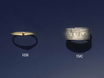 A Medieval English gold and amethyst single stone stirrup ring  
