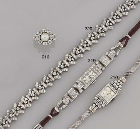 A lady's diamond wristwatch and a cultured pearl and diamond...