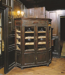 A STAINED OAK CORNER HUMIDOR CABINET  