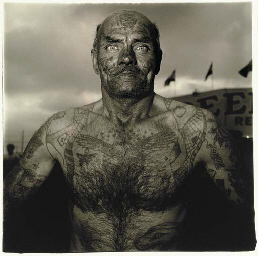 Tattooed man at a carnival, Md., 1970  