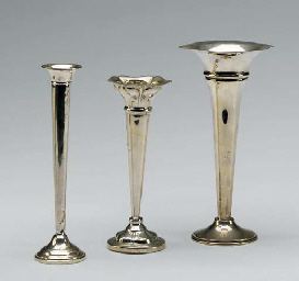 A PAIR OF SILVER BUD VASES AND EIGHT SILVER-PLATED BUD VASES...