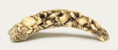 A BOAR'S TUSK NETSUKE