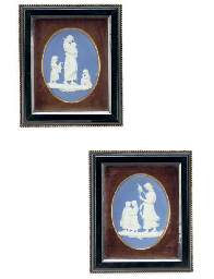 A PAIR OF WEDGWOOD OVAL BLUE JASPER WARE PLAQUES