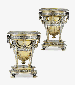 A FINE PAIR OF VICTORIAN PARCEL-GILT SILVER WINE COOLERS
