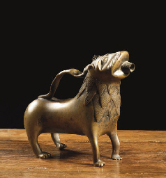 A brass aquamanile  
