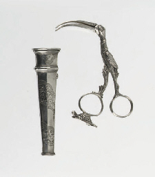 An unusual pair of dutch silver 'umbilical cord' tongs and a...