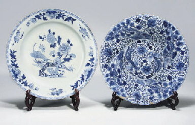 A large Chinese blue and white moulded 'phoenix' dish, Kangx...