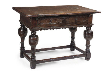 A FLEMISH OAK TABLE  