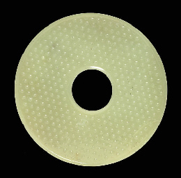 A RARE GREENISH-YELLOW JADE DISC, BI  