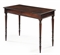 A REGENCY EBONY AND MAHOGANY SIDE TABLE