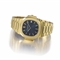 Patek Philippe. A fine and large 18K gold self-winding wristwatch with date and bracelet 
