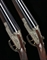 AN EXCEPTIONALLY FINE PAIR OF 12-BORE SELF-OPENING SIDELOCK EJECTOR GUNS BY HOLLAND & HOLLAND, NO. 40297/8