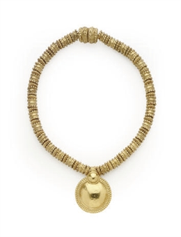 AN YVES SAINT LAURENT HAMMERED GILT-METAL 'ETHNIC' STYLE NECKLACE,  