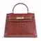 AN HERMÈS NOISETTE ALLIGATOR MINI KELLY BAG,  