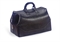 A SIMULATED LEATHER TRAVELING CASE,  