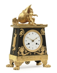 AN EMPIRE ORMOLU AND PATINATED STRIKING MANTEL CLOCK