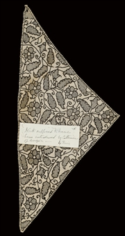 A BLACKWORK FOREHEAD CLOTH  